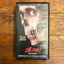 Load image into Gallery viewer, Evil Dead 2: Dead by Dawn (1987) ANCHOR BAY HARDSHELL VHS
